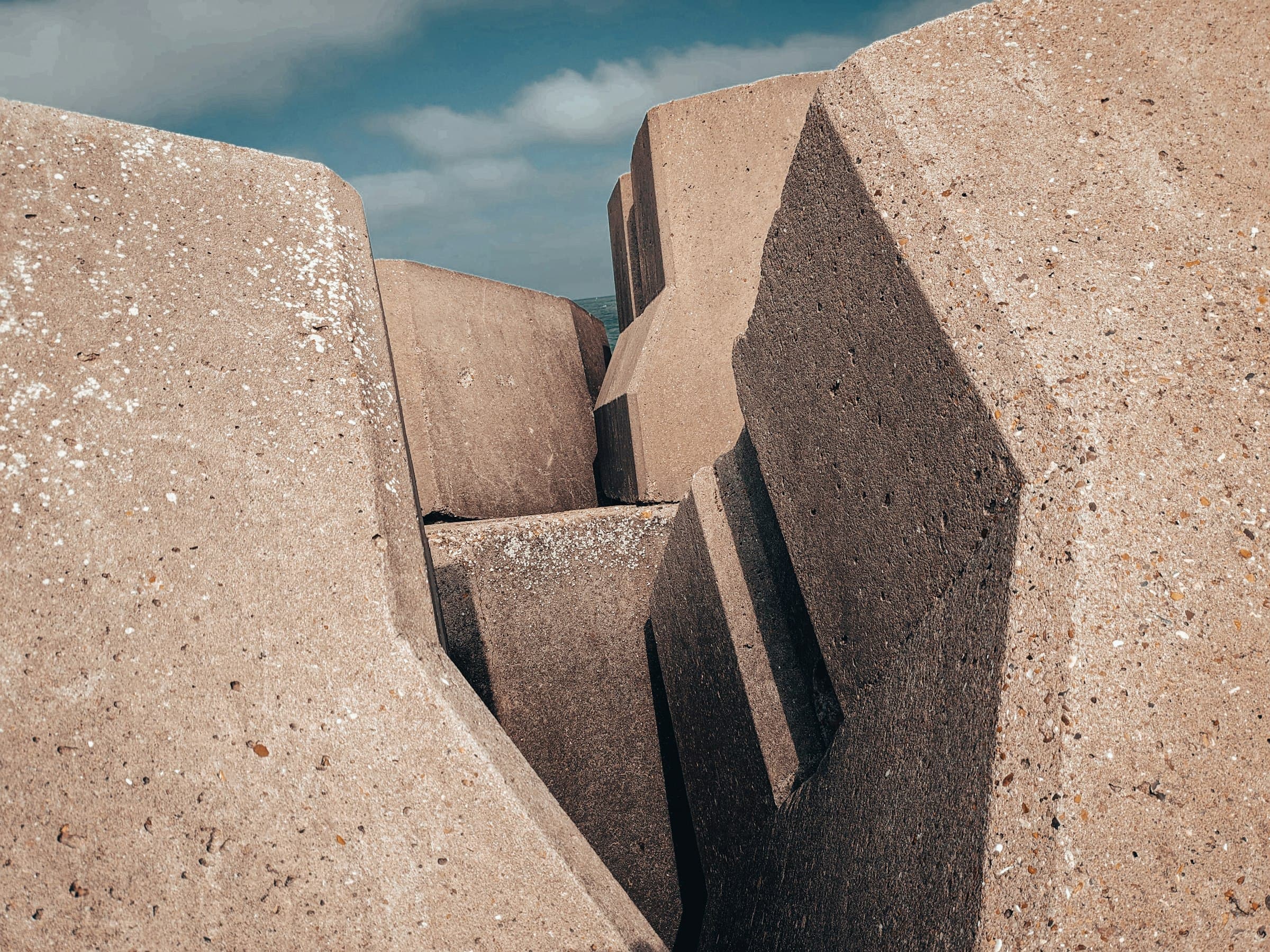 Sculpted stone blocks set in an architectural composition