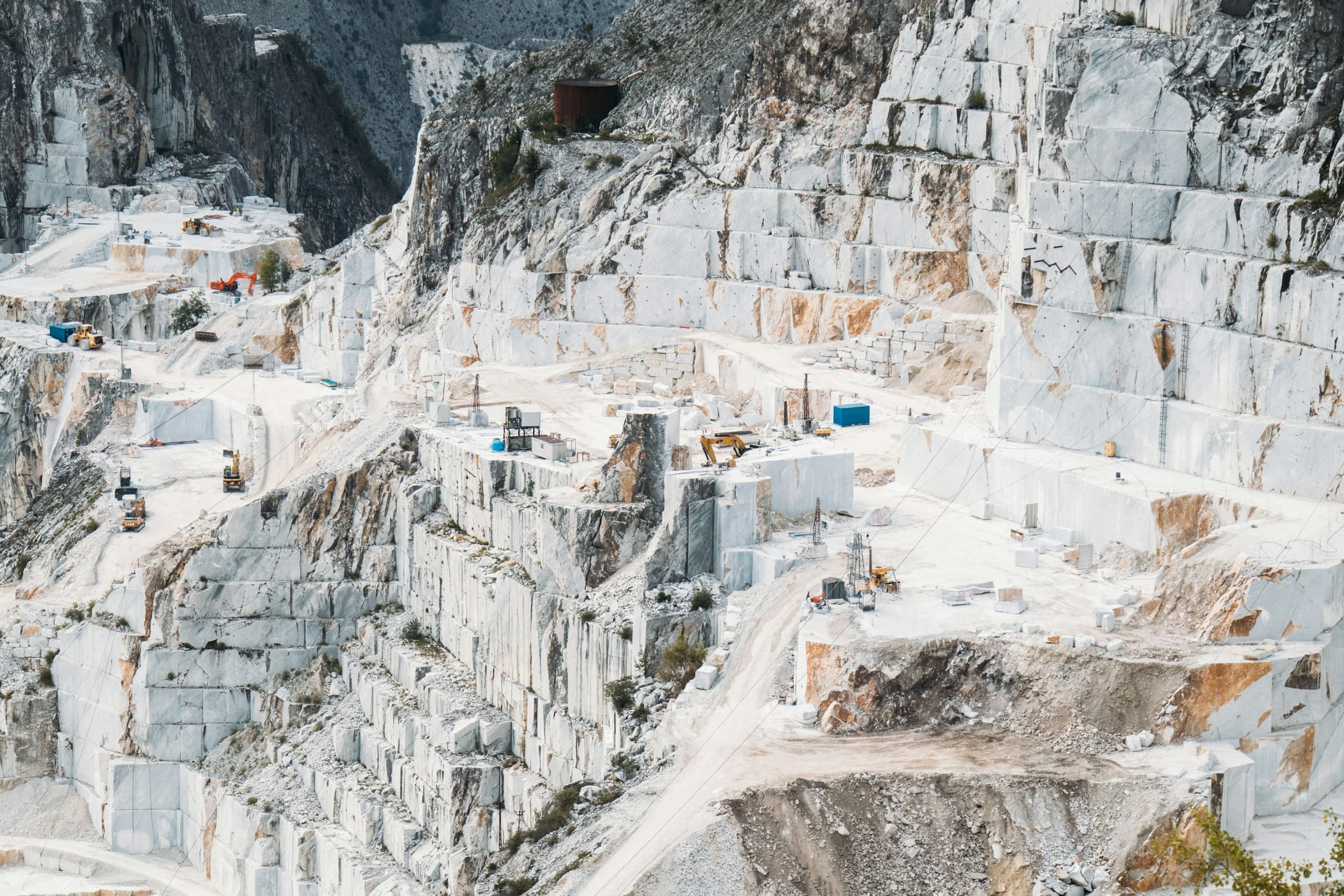 Terraced quarry face with cut blocks of natural stone
