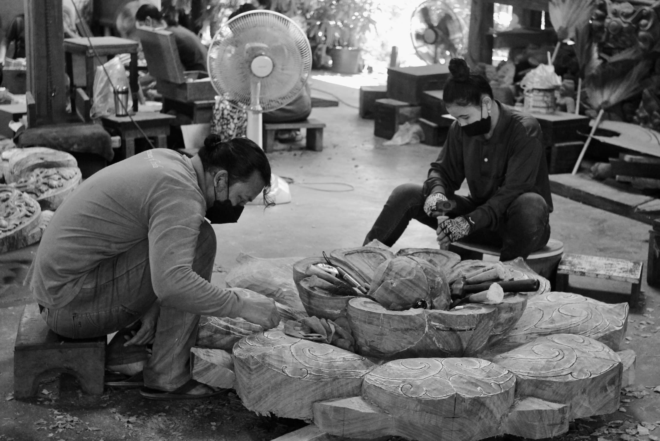 Stone workers dressing blocks in a workshop
